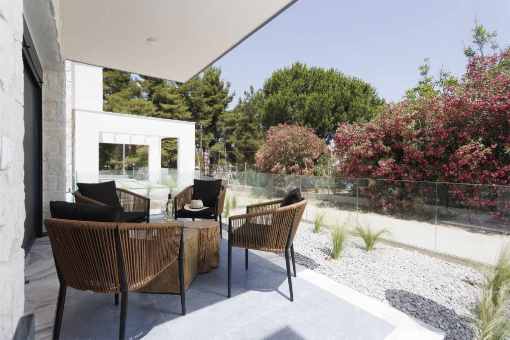 White Sand Apartment balcony chairs and table