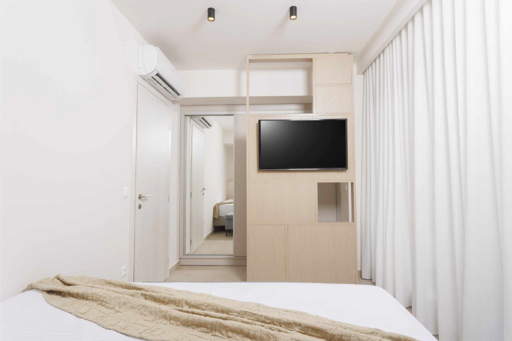 White Sand Apartment bedroom TV